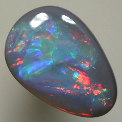 SOLID BLACK OPAL Very bright cherry reds move all over the face of the opal SEE VIDEO